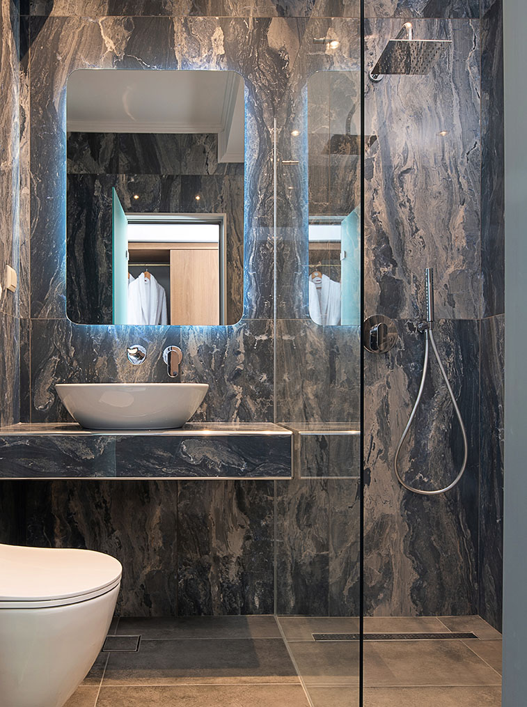 Front View Of Contemporary Gray Marble Bathroom With Vessel Bowl